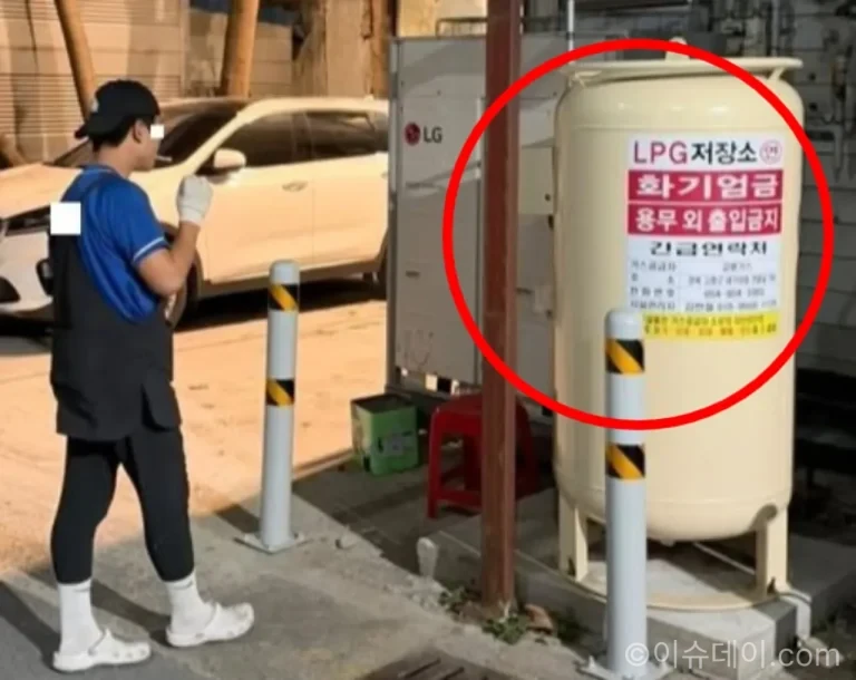화기엄금 표시가 붙은 LPG 저장용기 주변 흡연 논란 현장